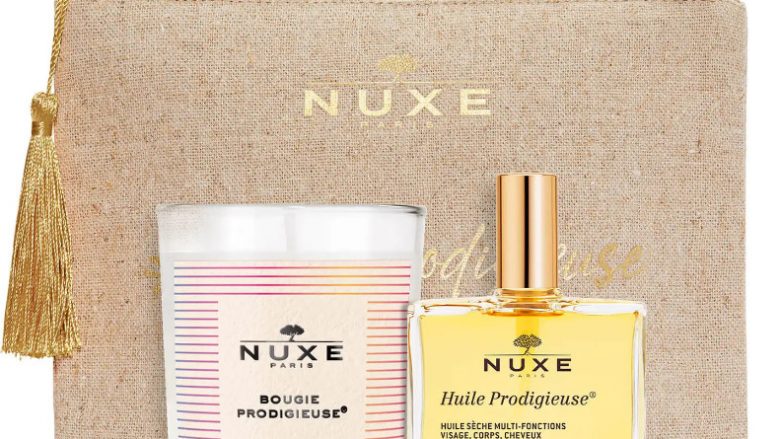 NUXE Neceser Huile Prodigieuse® 50 ml + Vela El tratamiento superventas de Nuxe y su vela para un ambiente relajante Ríndase a este dúo: el superventas NUXE y su Vela Prodigieuse® para un ambiente relajante, ¡a un precio increíble! El neceser contiene: - 1 Aceite seco Huile Prodigieuse 50 ml - 1 Vela Prodigieux® 70 g - y un neceser 100 % lino. Los elementos que componen el neceser se entregan por separado.