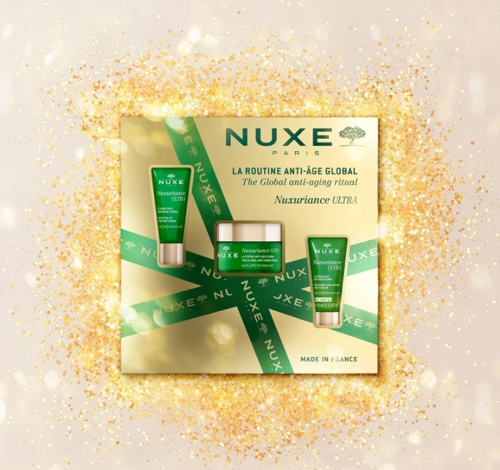 Comprar NUXE Set de regalo Nuxuriance Ultra en Gran Farmàcia Andorra. Ritual antiedad global. La rutina antiedad global Nuxuriance Ultra es más eficaz que el retinol*, gracias a la Tecnología Alfa [3R]**, que ayuda a [R]evitalizar, [R]enovar y [R]egenerar la piel. El set de regalo contiene:  - La Crema Antiedad Global Nuxuriance Ultra 50 ml - El Tratamiento para Contorno de Ojos y Labios Nuxuriance Ultra 15 ml - La Crema de Noche Antiedad Global Nuxuriance Ultra 15 ml Cosmética formulada y producida en Francia.  Set 100 % cartón, 0 % plástico y fabricado en Francia. Dimensiones: 235 x 71 x 230 mm